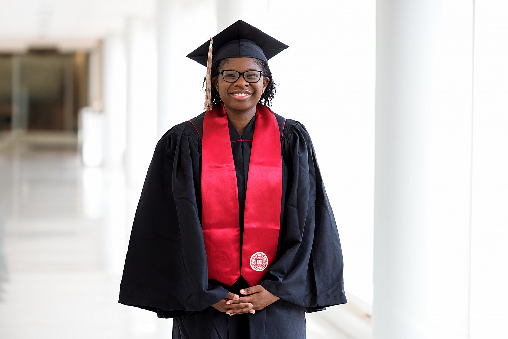 Undergraduate commencement speaker London Okowa posed for a photograph at the University Library. 