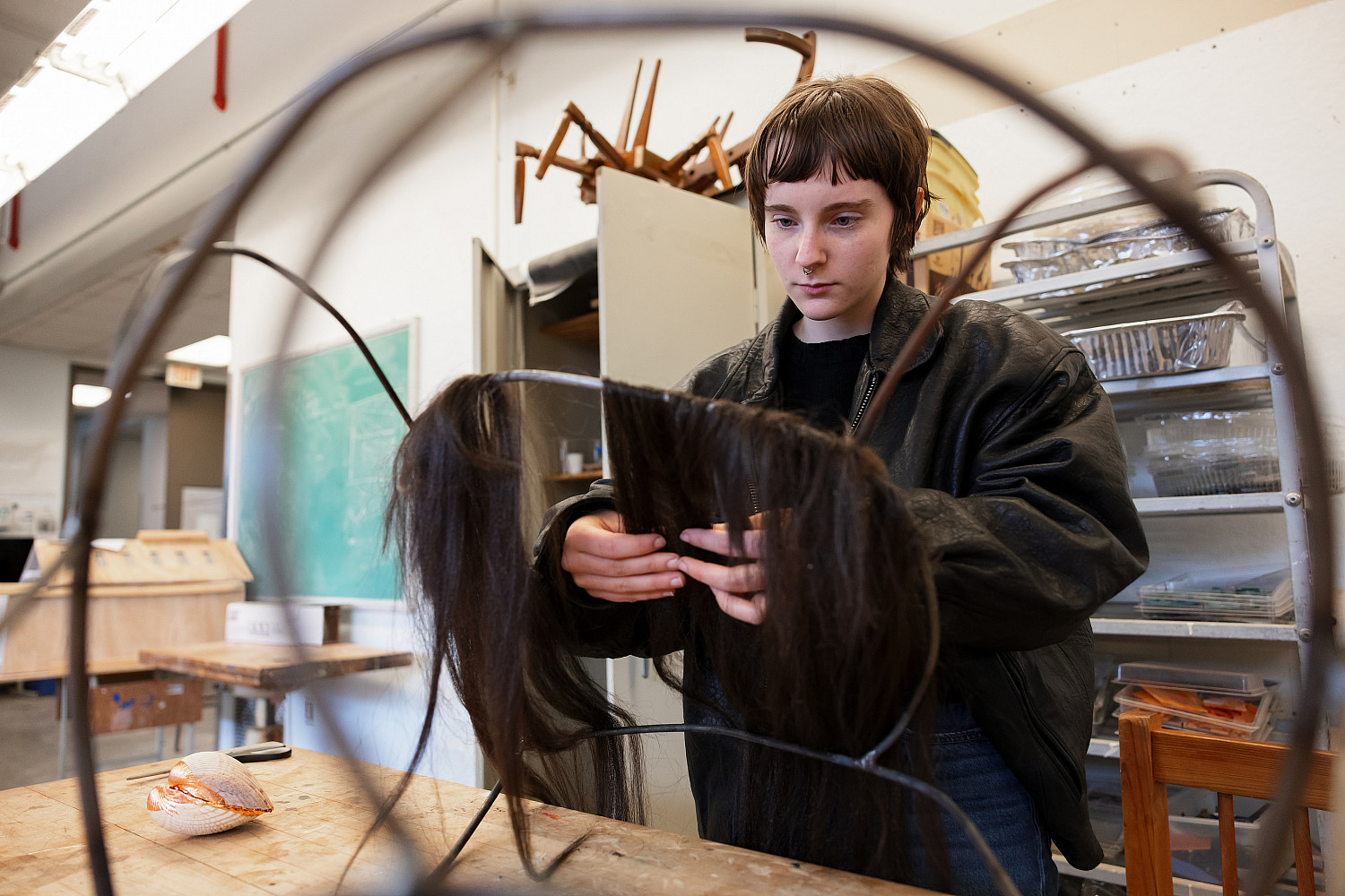 Kelsey Conner, a junior, built a wire frame that she is lining with synthetic hair to create a piece that fully covers the upper half of ...