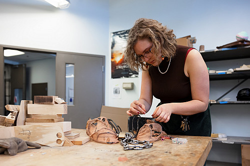 Junior Clara Schuman displayed a piece of steel molded to form an outline of lungs. The heaviness of the art will weigh on the model to r...