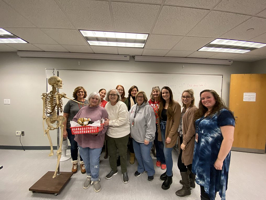 Professor Kellie Cranfill, front row left, stands with members of the Radiologic and Imaging Sciences Programs. Photo by Sara Griffin, In...