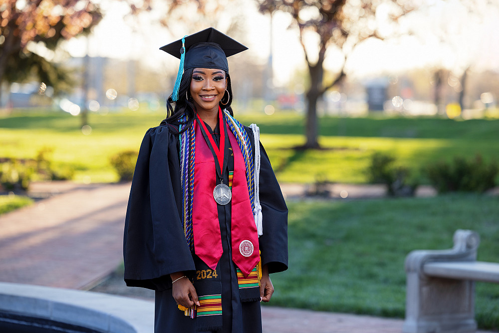 Faith Odiete, the 2024 undergraduate commencement speaker, poses for a photograph at Ball Garden. The photo was taken at IUPUI on Saturda...