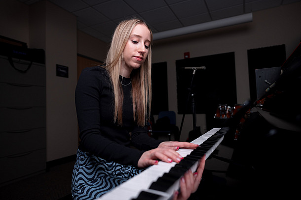 Myra Kivett plays piano and writes music on campus at the ICTC building. She is currently a graduate student completing her MA in Applied...