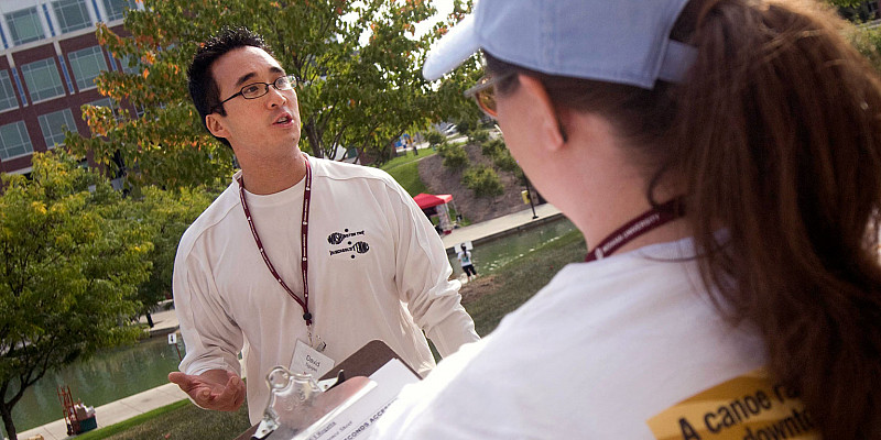 David Nguyen speaks with race judges during the inaugural IUPUI Regatta in 2009.