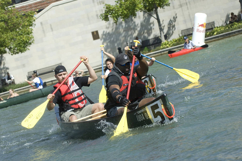 Rowers paddle down the canal during the races at IUPUI's first Regatta. 