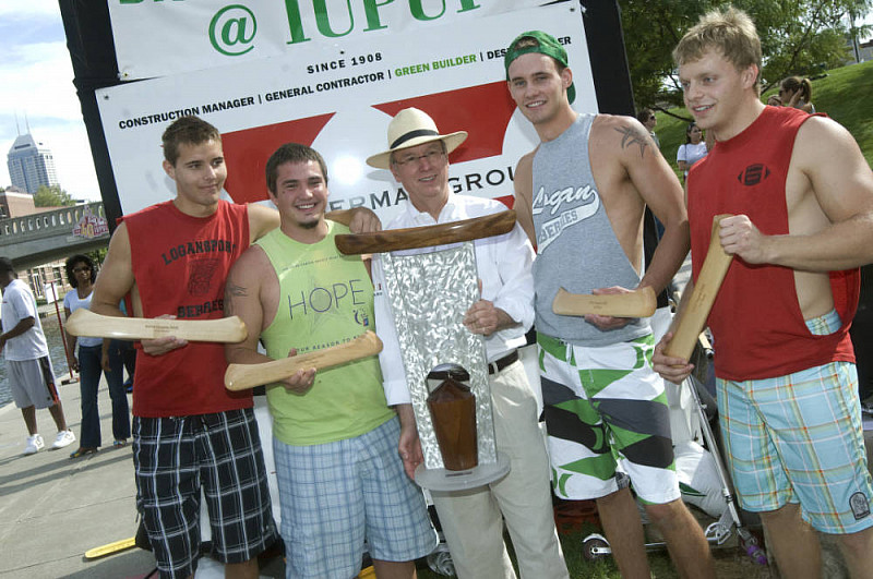 Chancellor Charles Bantz stands with the 2009 first place winning team. 