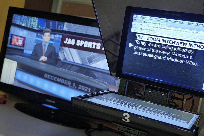 Jag Sports Zone 003 Teleprompters allow anchors to read their scripts while on camera. A teleprompter operator sits in the studio to scroll the story as the ...