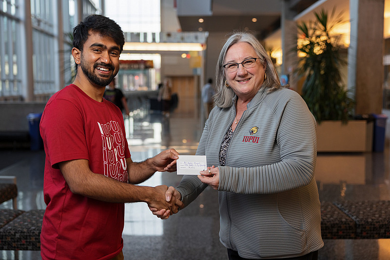 20231117 Ravi Shankar T-shirt Contest Winner (LK) In addition to his T-shirt design being sold in the IUPUI Bookstore, Kunapuli received a $250 gift card, presented to him by Beverly Knig...